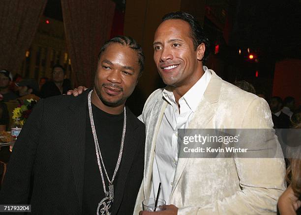 Actor/singer Alvin "Xzibit" Joiner and actor Dwayne "The Rock" Johnson pose at the afterparty for the premiere of Columbia's "Gridiron Gang" at The...