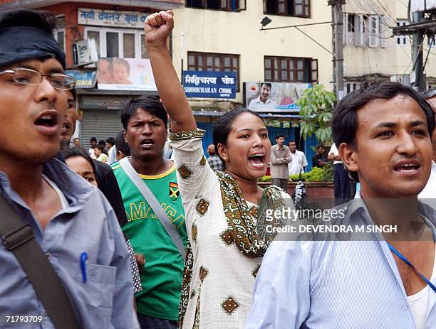 Nepalese political activists of the Newar ethnic community shout anti-King slogans during a protest held on the sidelines of the Indra Jatra Festival...