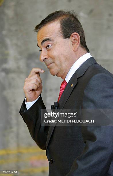 Carlos Ghosn, head of the French and Japanese automakers Renault and Nissan, arrives to present the "Qashqai" crossover, the new compact Nissan...