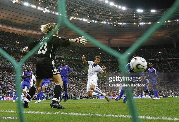 Alberto Gilardino scores for Italy during the Group B, Euro 2008 qualifying match between France and Italy at the Stade de France on September 6,...