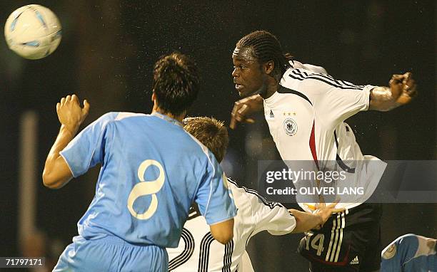 San Marino: Germany's Gerald Asamoah vies for the ball against San Marino's Mirko Palazzi during their Euro 2008 qualifying football match 06...