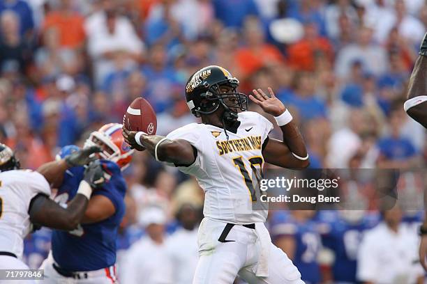 Quarterback Jeremy Young of the Southern Miss Golden Eagles throws a pass during the game against the University of Florida Gators at Ben Hill...