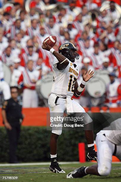 Quarterback Jeremy Young of the Southern Miss Golden Eagles throws a pass during the game against the University of Florida Gators at Ben Hill...