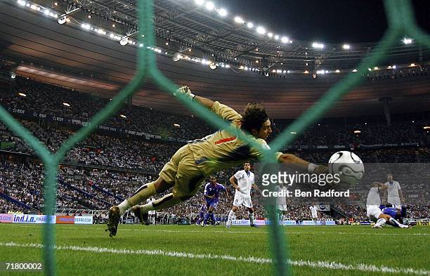 Gianluigi Buffon of Italy dives in vain as Sidney Gouvou scores the third goal for France during the Group B, Euro 2008 qualifying match between...