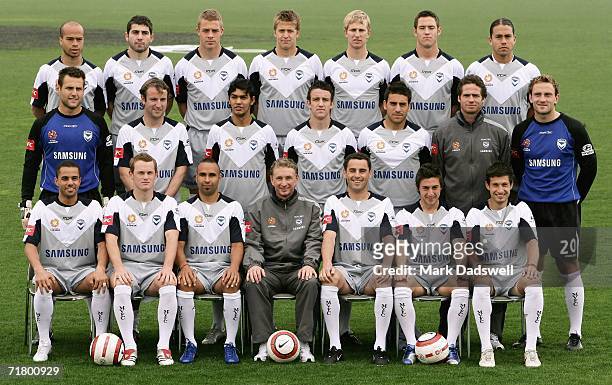 Players from the Melbourne Victory pose for a team photo in their away strip before a training session at the Melbourne Grammar School September 7,...