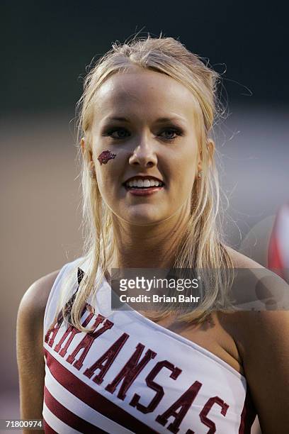 Female cheerleader of the Arkansas Razorbacks looks on during the game against the University of Southern California Trojans on September 2, 2006 at...