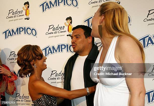 Actress Eva Longoria, comedian Carlos Mencia and wife Amy Mencia arrive at the El Sueno De Esperanza Gala at Wisteria Lane on the Universal Studios...