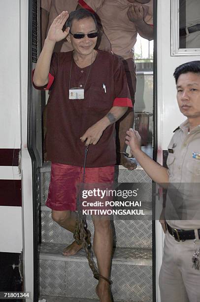 Vietnamese pilot and US citizen who hijacked a plane from Thailand in November 2000, Ly Tong waves as he arrives at the Criminal Court in Bangkok, 07...