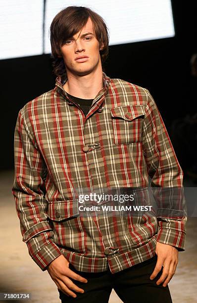 Model parades an outfit by Australian label Mayson during a New Generation show at Australian Fashion Week, in Melbourne 04 September 2006. Designers...