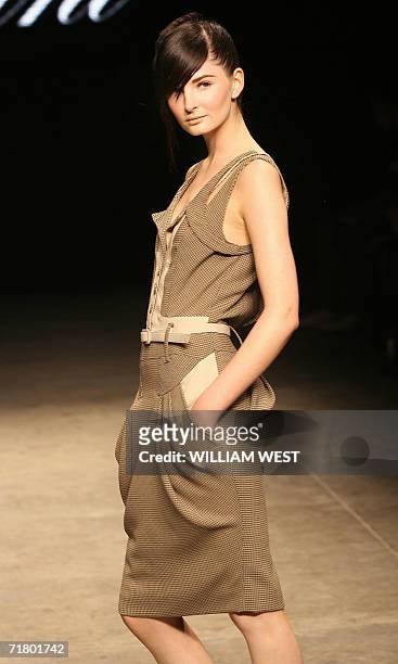 Model parades an outfit by Australian label Dhini during a New Generation show at Australian Fashion Week, in Melbourne 04 September 2006. Designers...
