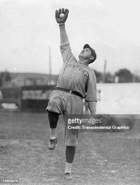 Babe Ruth strikes a fielding pose during workouts at the New York Yankees spring training site in Shreveport, Louisiana in March of 1921.