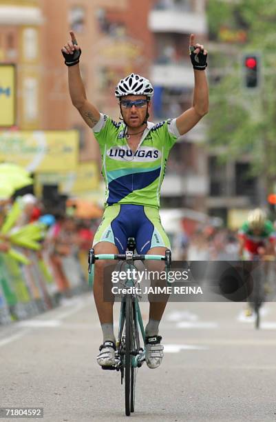 Italy's Luca Paolini of Liquigas Team celebrates at the finish line as the winner of the twelfth stage of the 61st edition of the Tour of Spain...