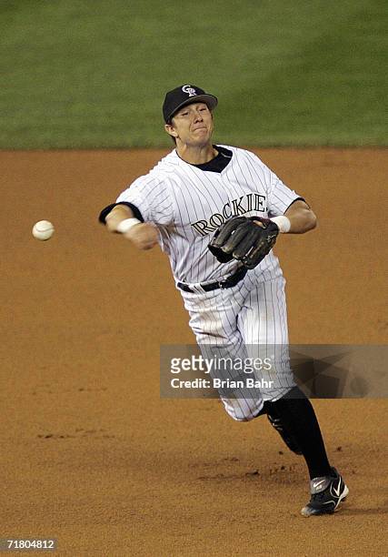 Shortstop Troy Tulowitzki of the Colorado Rockies throws to first base for an out against the New York Mets in the seventh inning on August 31, 2006...