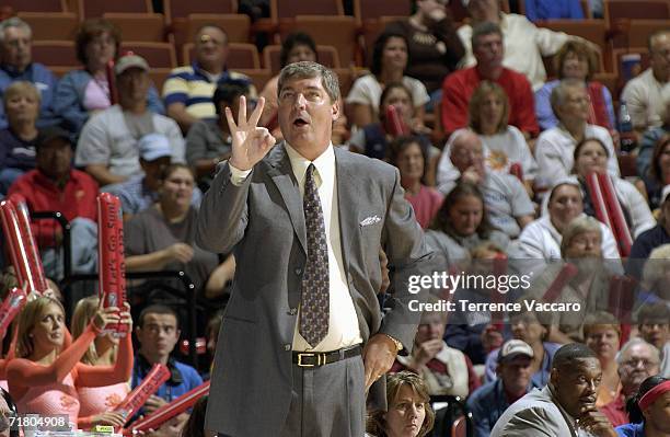 Head coach Bill Laimbeer of the Detroit Shock sends signals against the Connecticut Sun in game three of the WNBA Eastern Conference Finals on August...