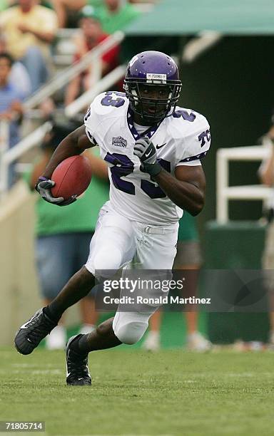 Running back Aaron Brown of the TCU Horned Frogs runs with the ball during the game against the Baylor Bears on September 3, 2006 at Floyd Casey...