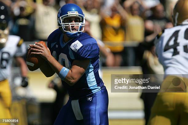 Quaterback Jake Swank of the Indiana State University Sycamores drops back to pass against the Purdue University Boilermakers on September 2, 2006 at...