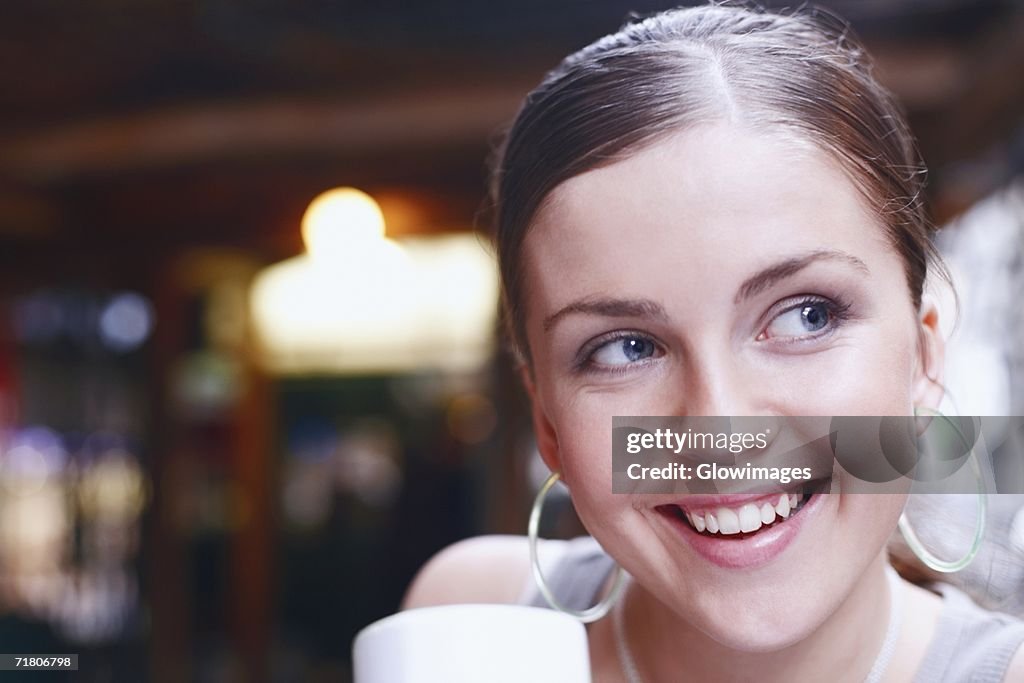 Close-up of a young woman smiling