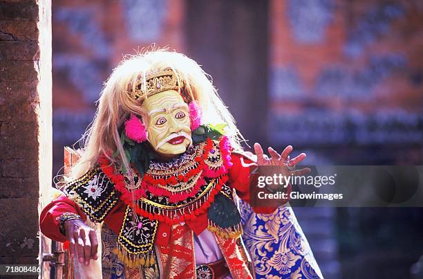 close-up of a balinese stage performer gesturing with her hands, bali, indonesia - balinese headdress stock pictures, royalty-free photos & images
