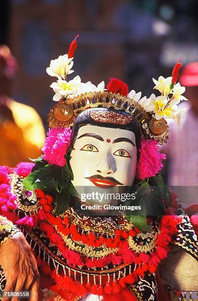 close-up of a stage performer wearing a costume, bali, indonesia - balinese headdress stock pictures, royalty-free photos & images