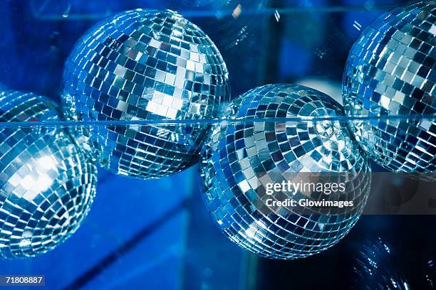 low angle view of disco balls - see thru nightgown - fotografias e filmes do acervo