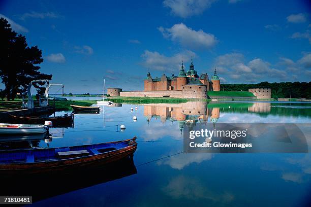 reflection of a castle in a pond, kalmar castle, smaland, sweden - kalmar stock pictures, royalty-free photos & images