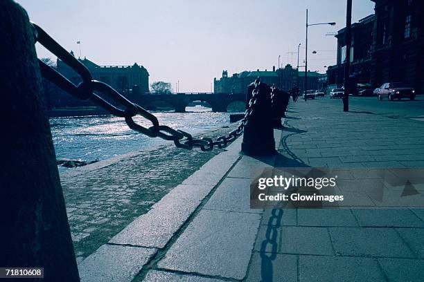 bollard along a sidewalk, stockholm, sweden - bollards stock pictures, royalty-free photos & images