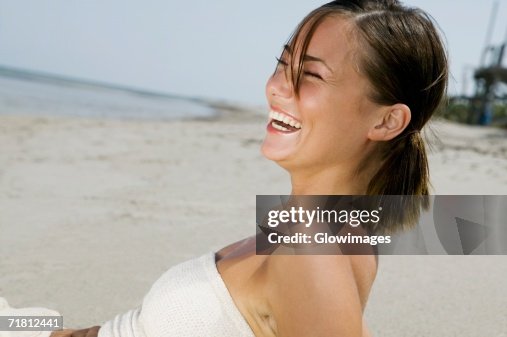 Beach Rode Side Profile Side Profile Of A Young Woman Reclining On The Beach High-Res Stock ...