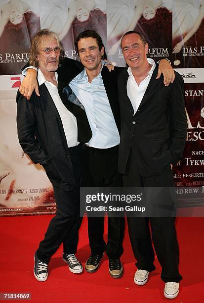 Screenwriter Andrew Birkin, director Tom Tykwer and producer Bernd Eichinger attend the world premiere of the film "Das Parfum" September 7, 2006 in...
