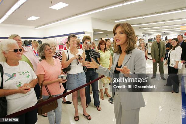 Actress and designer Jaclyn Smith talks to fans standing in line to see her during an appearance at a K-Mart Store in St. Louis on September 7, 2006....