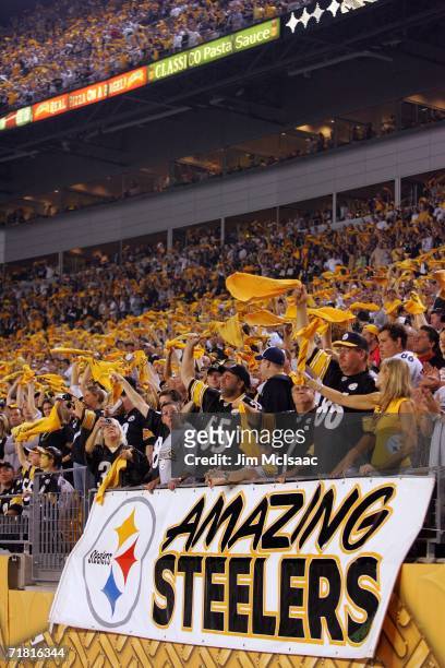 Fans of the Pittsburgh Steelers wave their "Terrible Towels? as their team takes on the Miami Dolphins for the first game of the NFL season on...