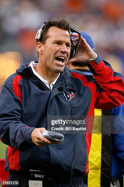 Head Coach Gary Kubiak of the Houston Texans yells out plays during a preseason game against the Denver Broncos at Invesco Field on August 27, 2006...