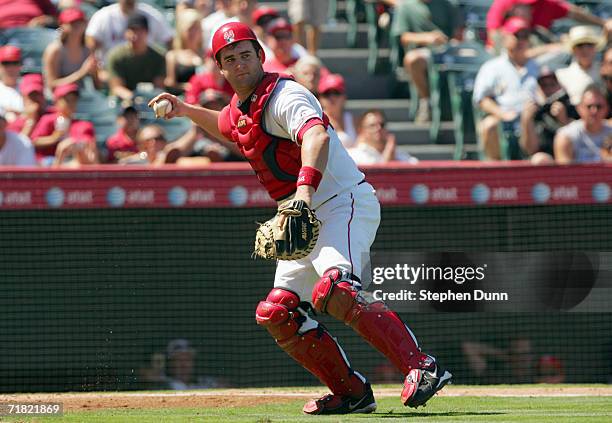 Catcher Mike Napoli of the Los Angeles Angels of Anaheim throws the ball during the game against the Baltimore Orioles on September 6, 2006 at Angel...