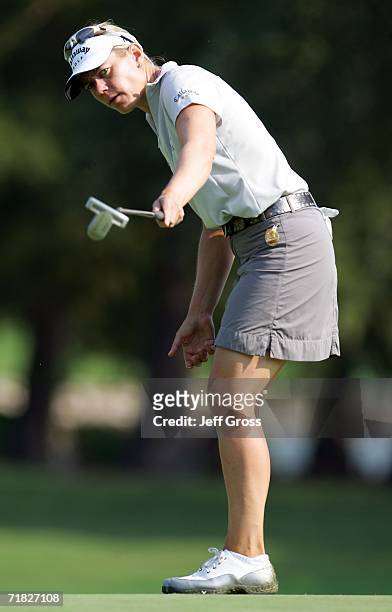 Annika Sorenstam of Sweden reacts as she sinks a birdie putt on the fifteenth hole during the first round of the John Q. Hammons Hotel Classic on...