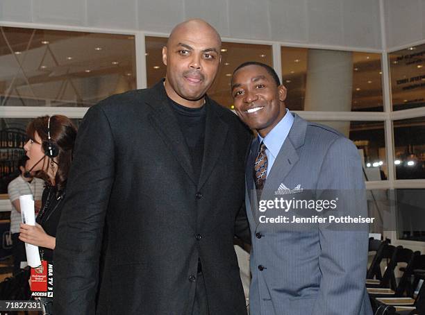 Hall of Fame inductee Charles Barkley poses for a photo with Hall of Fame member Isiah Thomas during the 2006 Basketball Hall of Fame induction...