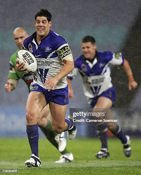 Nick Kouparitsas of the Bulldogs makes a break during the NRL Third Qualifying Final between the Bulldogs and the Canberra Raiders at Telstra Stadium...