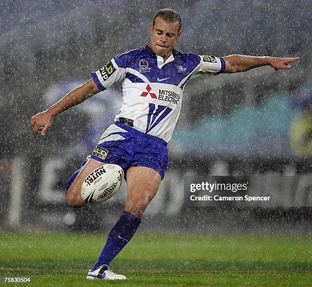 Daniel Holdsworth of the Bulldogs kicks the ball during the NRL Third Qualifying Final between the Bulldogs and the Canberra Raiders at Telstra...