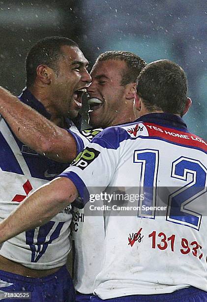 Andrew Emelio of the Bulldogs celebrates scoring a try during the NRL Third Qualifying Final between the Bulldogs and the Canberra Raiders at Telstra...