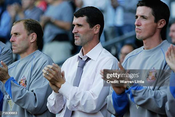 Sunderland manager Roy Keane claps from the bench during the Coca-Cola Championship match between Derby County and Sunderland at Pride Park on...