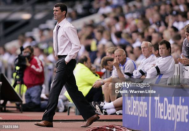 Sunderland manager Roy Keane walks out to speak with the line assistant during the Coca-Cola Championship match between Derby County and Sunderland...