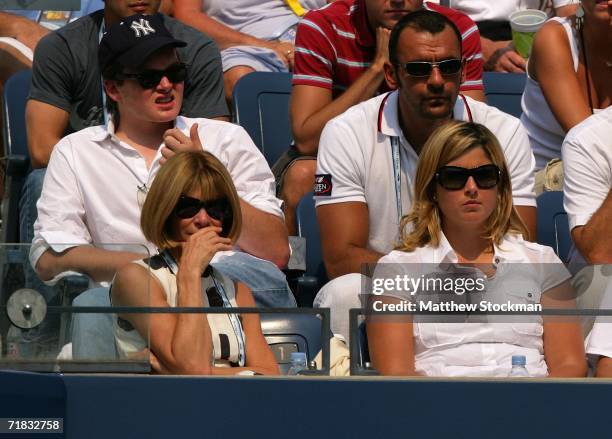 Fashion Editor Anna Wintour and Mirka Vavrinec watche as Roger Federer of Switzerland takes on Nikolay Davydenko of Russia during the men's...