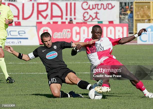 Del Piero of Juventus competes with Barusso of Rimini during the the Serie B match between Rimini and Juventus at the Romeo Neri stadium, September...