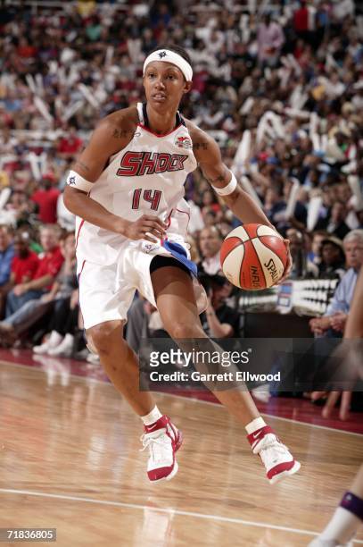 Deanna Nolan of the Detroit Shock dribbles against the Sacramento Monarchs during Game Five of the WNBA Finals September 9, 2006 at Joe Louis Arena...
