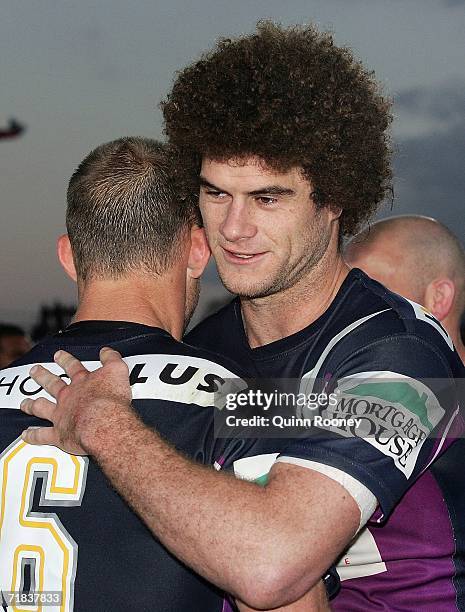 Matt King hugs Scott Hill of the Storm after victory in the NRL Fourth Qualifying Final between the Melbourne Storm and the Parramatta Eels at...