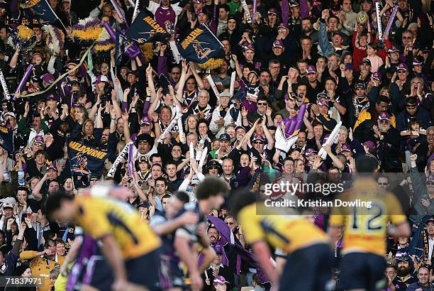 Storm fans cheer as the siren sounds during the NRL Fourth Qualifying Final between theMelbourne Storm and the Parramatta Eels at Olympic Park on...