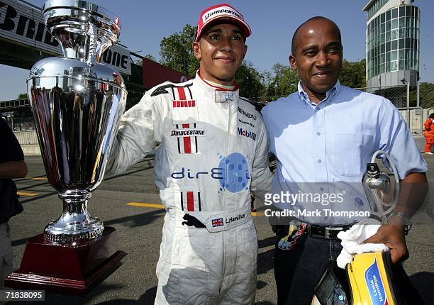 Lewis Hamilton of Great Britain and Art GP2 team celebrates winning the GP2 championship with his Father Anthony Hamilton after finishing second in...