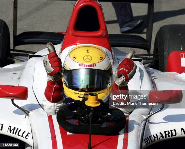 Lewis Hamilton of Great Britain and Art GP2 team celebrates winning the GP2 championship after finishing second in the last GP2 race of the year,...