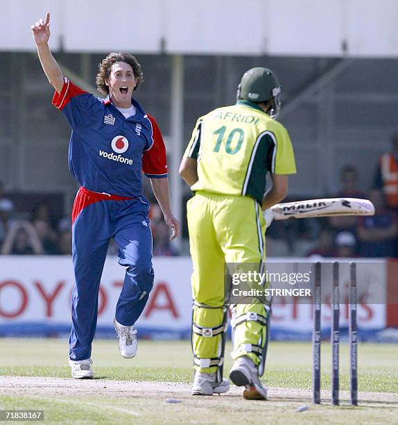 Birmingham, UNITED KINGDOM: Pakistan's Shahid Afridi is bowled out by England's Jon Lewis during the fifth and final one-day international against...