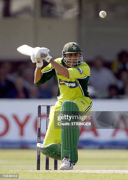 Birmingham, UNITED KINGDOM: Pakistan's Younis Khan ducks a bouncer from England bowler Sajid Mahmood during the fifth and final one-day international...