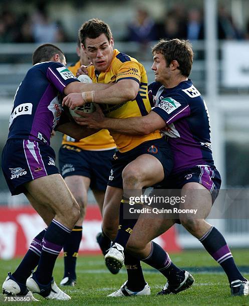 John Morris of the Eels breaks through a tackle during the NRL Fourth Qualifying Final between the Melbourne Storm and the Parramatta Eels at Olympic...