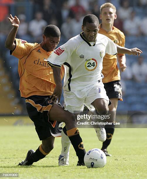 Seb Carole of Leeds battles with Mark Little of Wolves during the Coca-Cola Championship match between Leeds United and Wolverhampton Wanderers at...